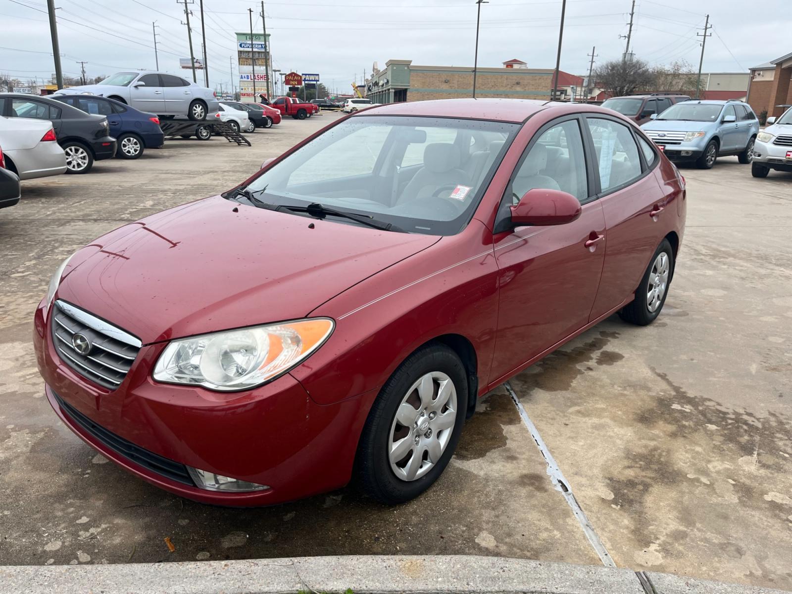 2008 red /TAN Hyundai Elantra GLS (KMHDU46D78U) with an 2.0L L4 DOHC 16V engine, Manual transmission, located at 14700 Tomball Parkway 249, Houston, TX, 77086, (281) 444-2200, 29.928619, -95.504074 - Photo #2